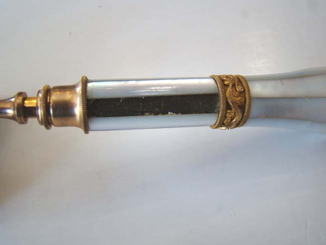 A very fine pair of late 19th century French Opera Glasses with folding handle — image 4